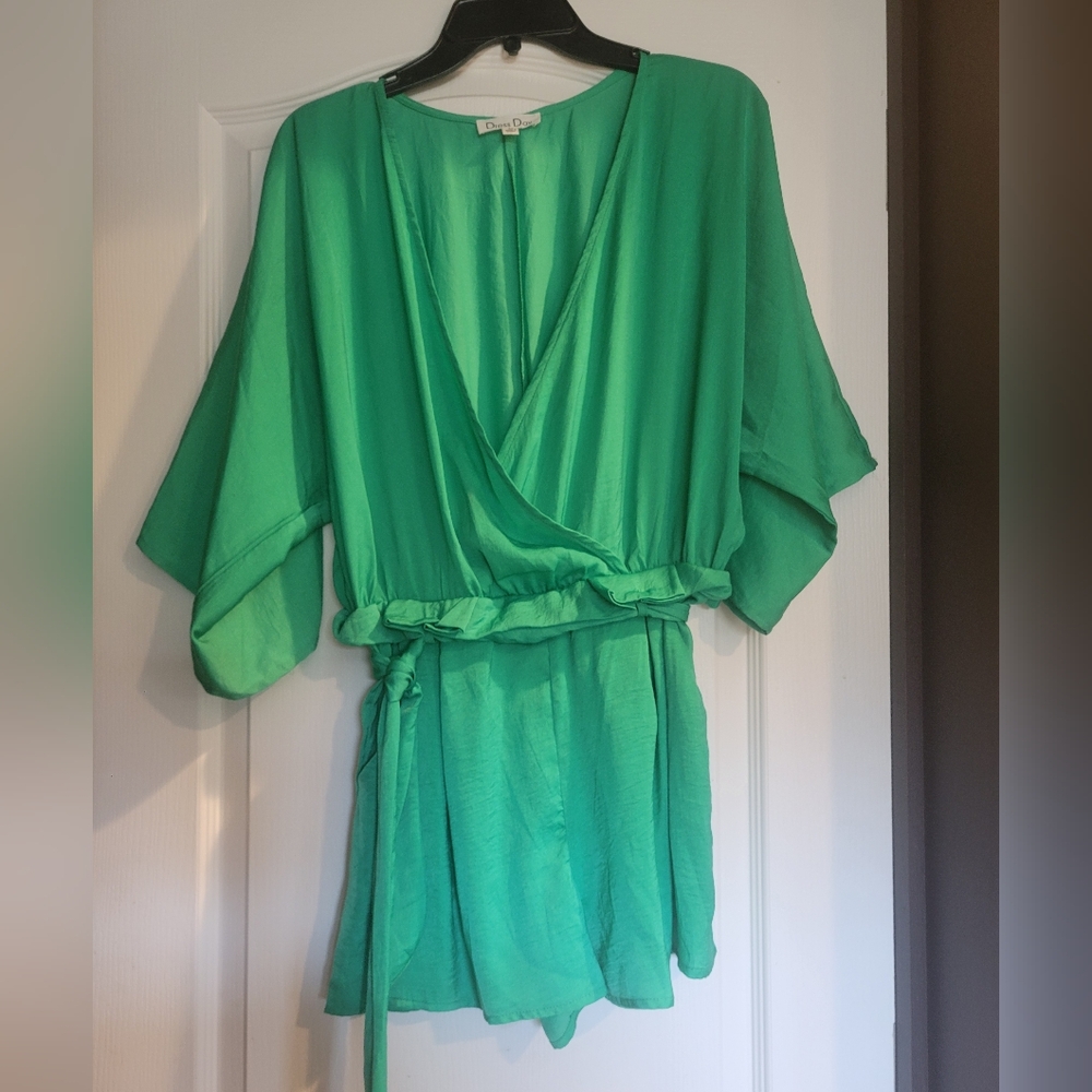Green romper with pockets